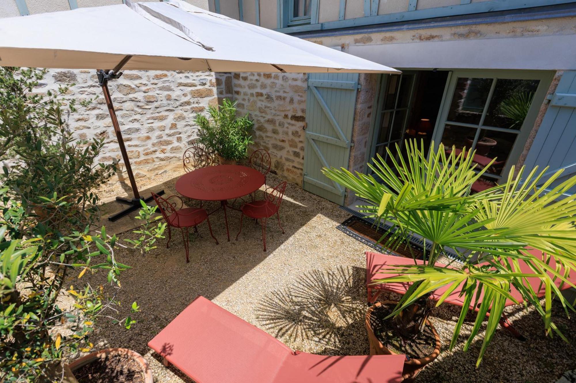 Maison D'Hotes Les Jardins Saint Eloi Le Lonzac Exterior foto